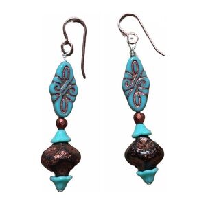 Turquoise Copper colored earrings. Artisan